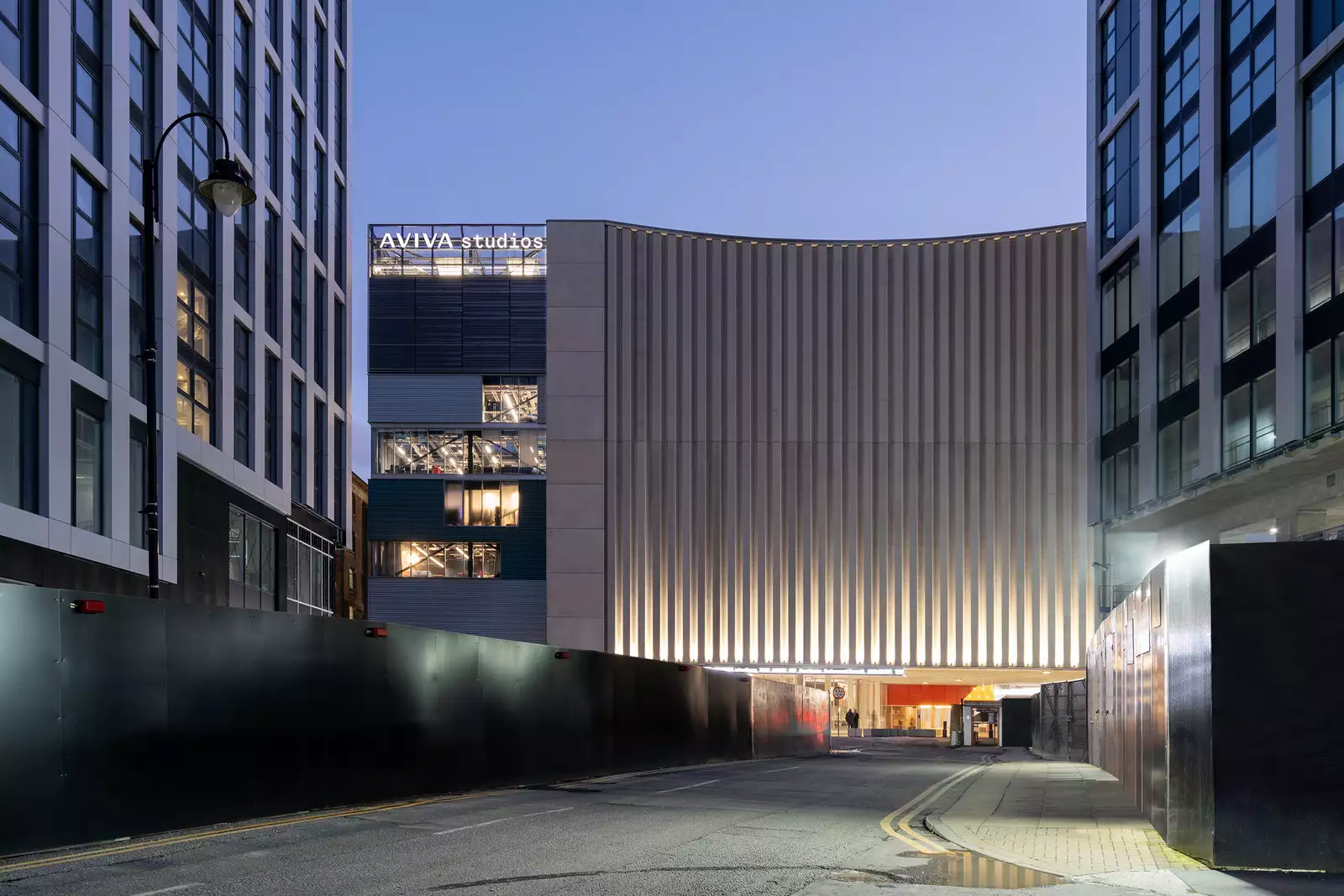 Photo of the exterior of Aviva Studios at night