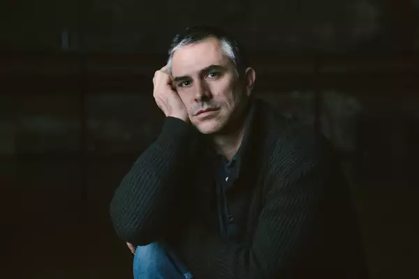 A headshot of the director Amir Nizar Zuabi