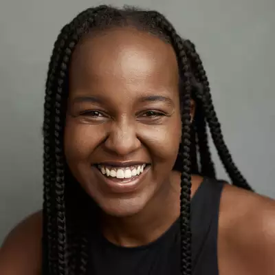 Headshot of Linda Wachaga smiling