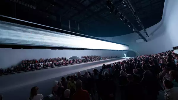 The audience watching the Free Your Mind stage lit up with white lighting