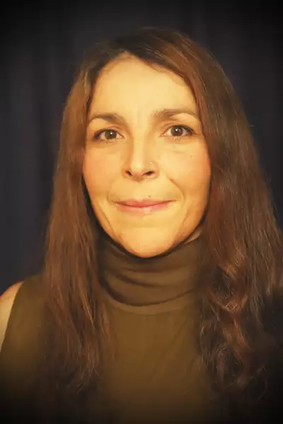 Gemma Khawaja in a brown polo neck