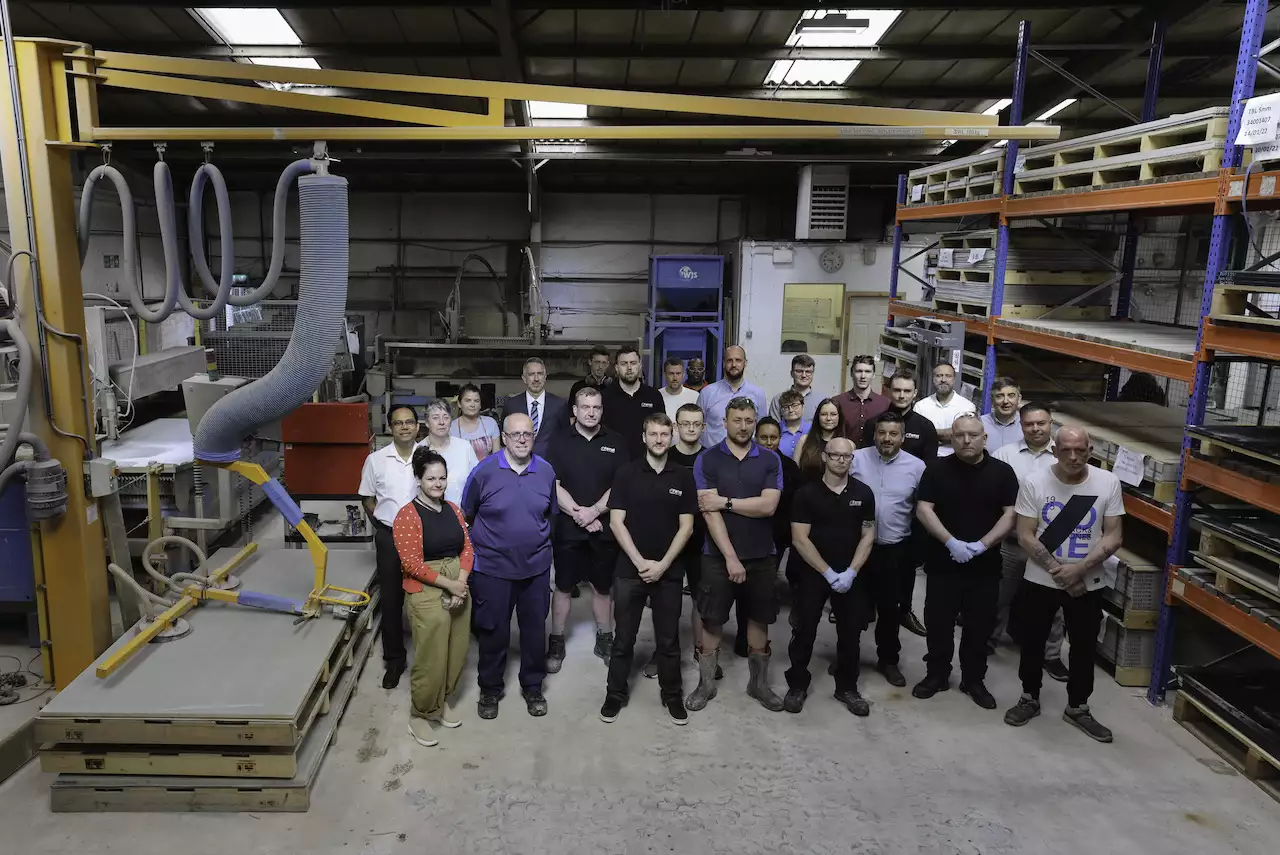 Group photograph of workers from Farrat