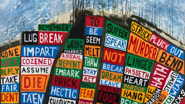 The cover of Radiohead’s Hail to the Thief – which is a collage of colourful text blocks stacked on top of each other. The text has been replaced by words from Hamlet.