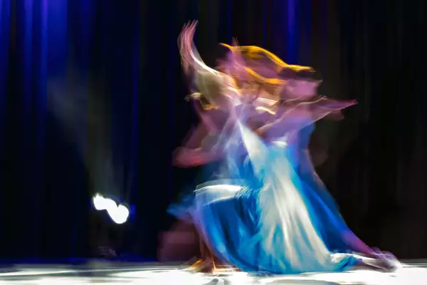 Photograph of two dancers on stage