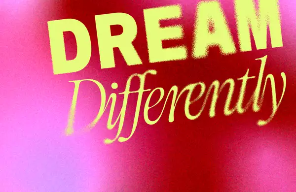 A bold, artistic graphic with the words "DREAM Differently" in yellow text against a red and pink gradient background with a grainy texture.
