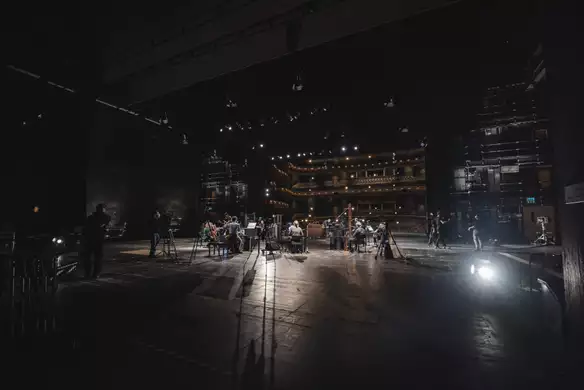 Paraorchestra in an empty large auditorium